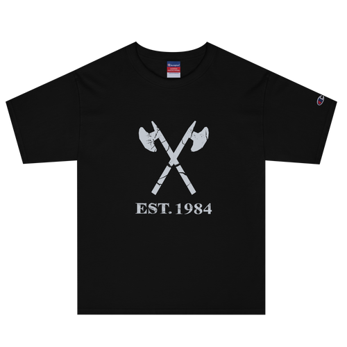 Black heavyweight, 100% cotton luxury Champion© t-shirt featuring aged crossed axes emblem and text "EST. 1984" indicating the year the faction was first introduced to the brick universe. Item is a BRKDrip Heritage Collection luxury shirt with a vintage castle building block aesthetic.