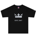 Black heavyweight, 100% cotton luxury Champion© t-shirt featuring aged crown emblem and text "EST. 2007" indicating the year the faction was first introduced to the brick universe. Item is a BRKDrip Heritage Collection luxury shirt with a vintage castle building block aesthetic.