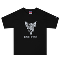 Black heavyweight, 100% cotton luxury Champion© t-shirt featuring aged dragon master emblem and text "EST. 1988" indicating the year the faction was first introduced to the brick universe. Item is a BRKDrip Heritage Collection luxury shirt with a vintage castle building block aesthetic.