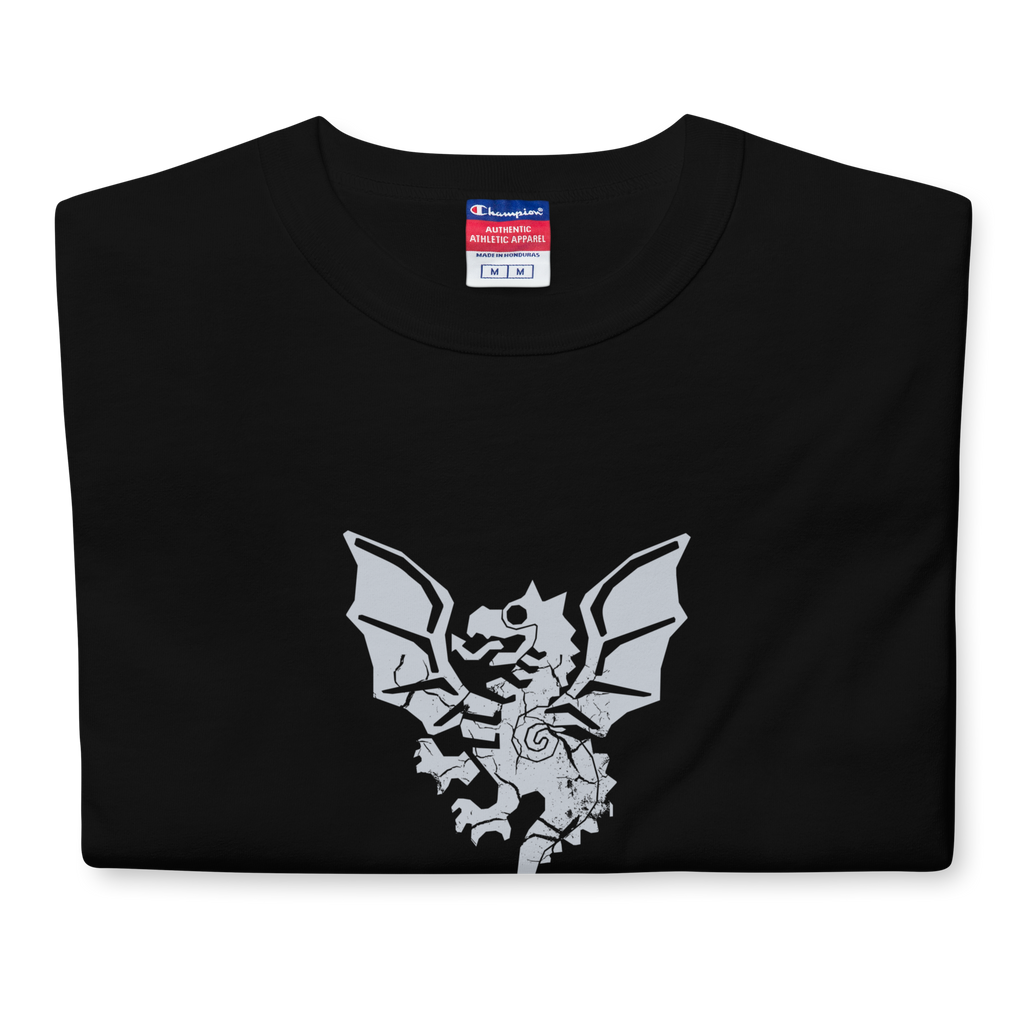 Folded black heavyweight, 100% cotton luxury Champion© t-shirt featuring aged dragon master emblem and text "EST. 1988" indicating the year the faction was first introduced to the brick universe. Item is a BRKDrip Heritage Collection luxury shirt with a vintage castle building block aesthetic.
