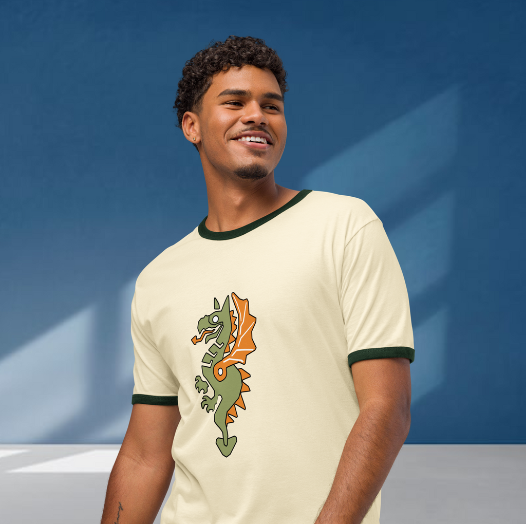 Fashionable male model wearing a natural-colored airlume cotton t-shirt featuring classic fan-made reimagined dragon masters faction design with high-contrast green ribbing on the sleeve and neck. Item is a BRKDrip Retro Collection t-shirt with a vintage castle building blocks aesthetic.