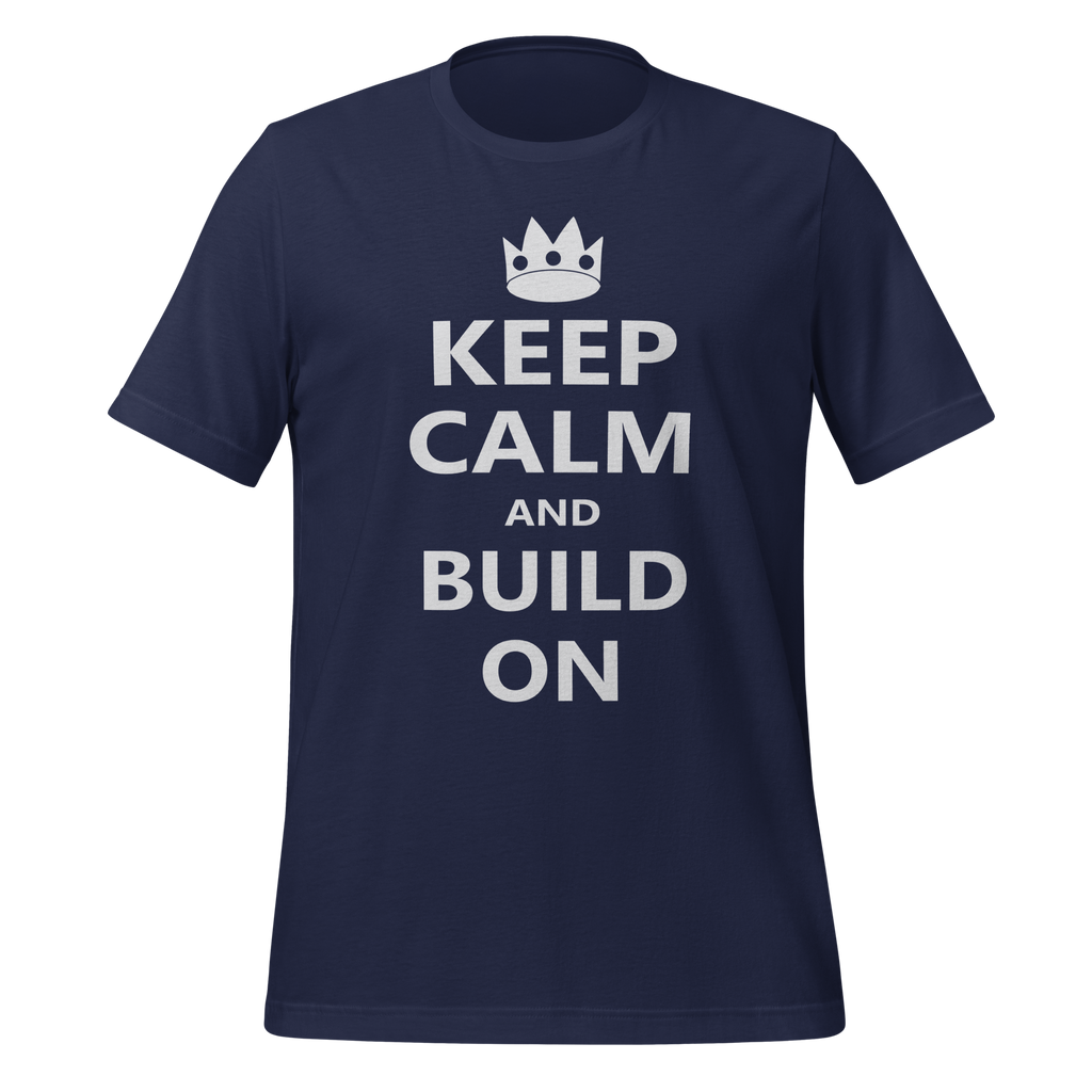 Navy blue 100% airlume cotton t-shirt featuring OG castle crown and parody AFOL saying: "Keep Calm and Build On". Item is a BRKDrip AFOL essentials shirt with a modern brick-inspired aesthetic.