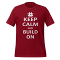Cardinal red 100% airlume cotton t-shirt featuring OG castle crown and parody AFOL saying: "Keep Calm and Build On". Item is a BRKDrip AFOL essentials shirt with a modern brick-inspired aesthetic.