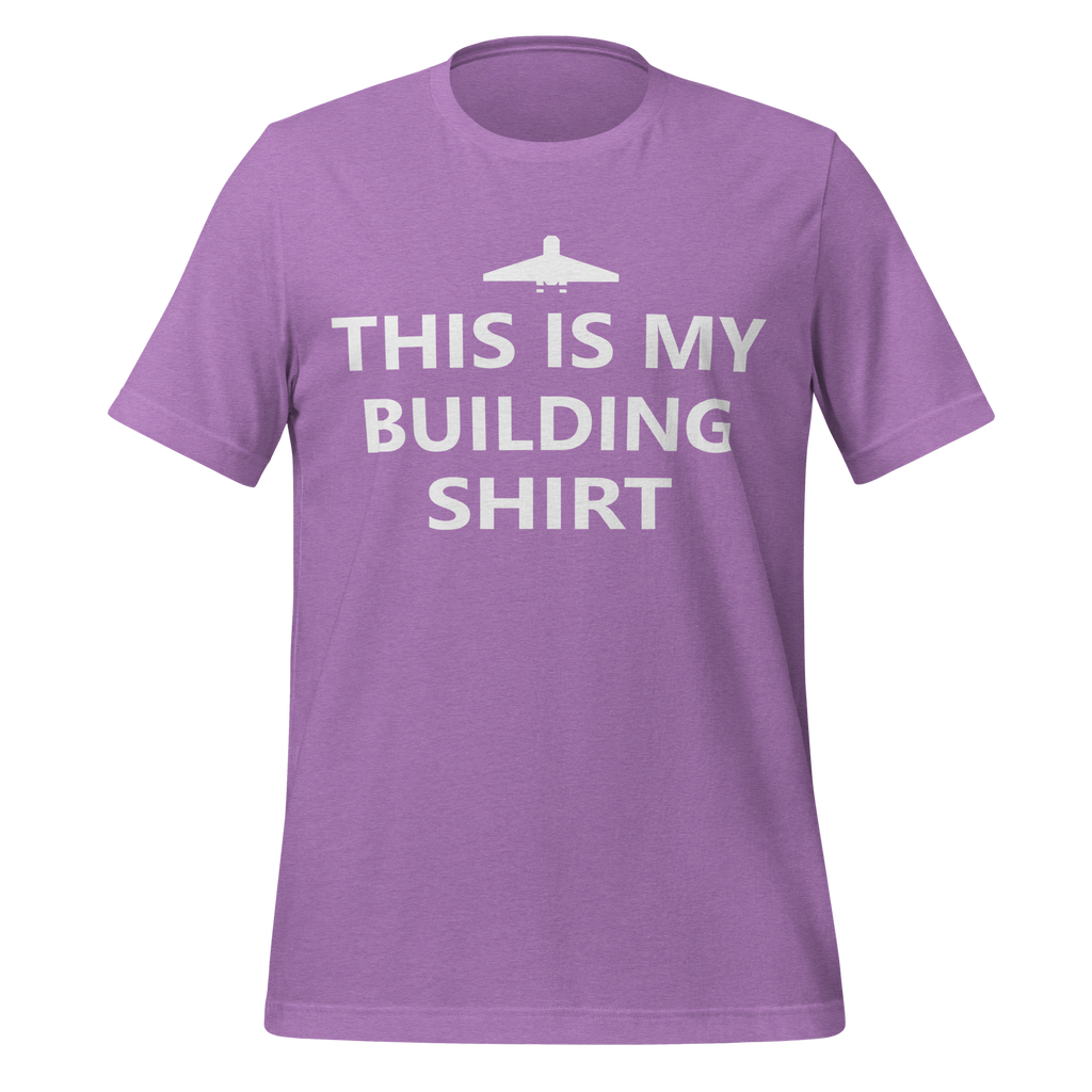 Heather purple airlume cotton t-shirt featuring brick city airport logo and parody AFOL saying: "This is my Building Shirt". Item is a BRKDrip AFOL essentials shirt with a modern brick-inspired aesthetic.