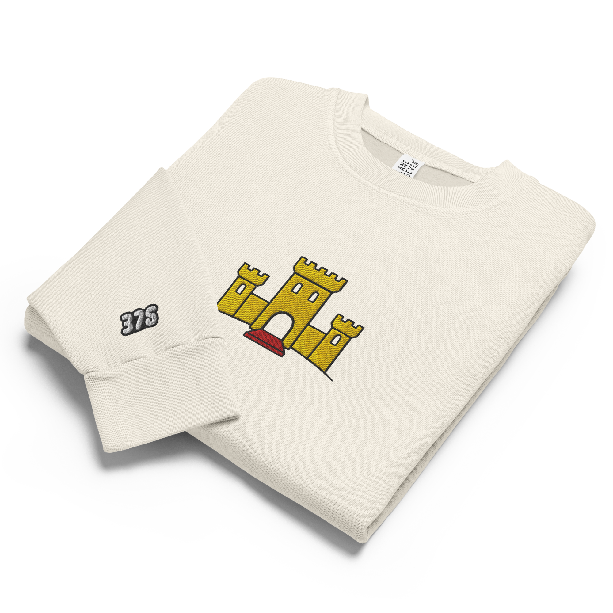 Off-white lunar rock tri-blend fleece sweatshirt featuring a classic fan-made OG yellow castle design embroidered across the front and setshirt number 375 on the sleeve. Item is a BRKDrip Limited Edition Cozy Wear Sweatshirt with a vintage castle building blocks aesthetic.