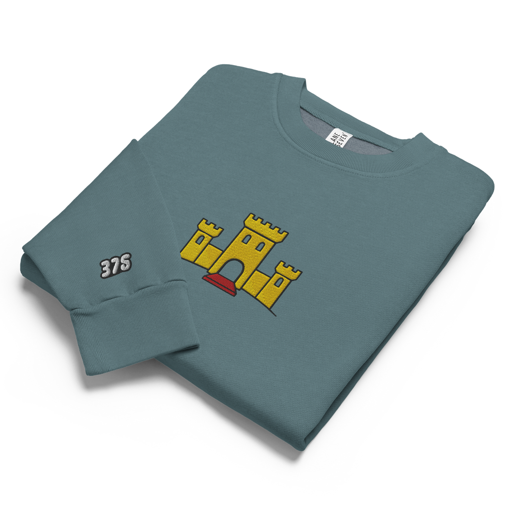 Pebble blue tri-blend fleece sweatshirt featuring a classic fan-made OG yellow castle design embroidered across the front and setshirt number 375 on the sleeve. Item is a BRKDrip Limited Edition Cozy Wear Sweatshirt with a vintage castle building blocks aesthetic.