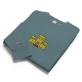 Pebble blue tri-blend fleece sweatshirt featuring a classic fan-made OG yellow castle design embroidered across the front and setshirt number 375 on the sleeve. Item is a BRKDrip Limited Edition Cozy Wear Sweatshirt with a vintage castle building blocks aesthetic.