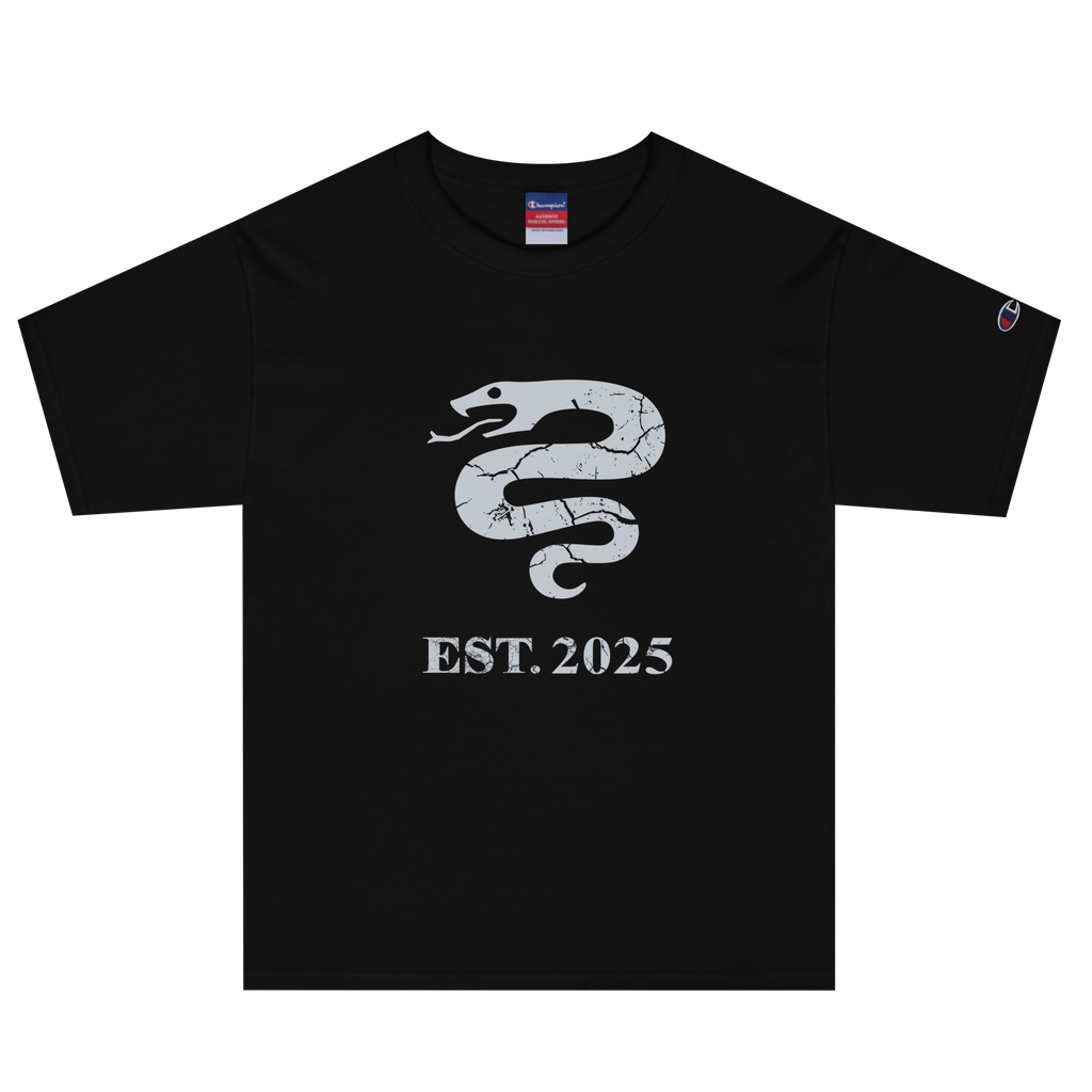 Black heavyweight, 100% cotton luxury Champion© t-shirt featuring aged serpent emblem and text "EST. 2025" indicating the year the faction was first introduced to the brick universe. Item is a BRKDrip Heritage Collection luxury shirt with a vintage castle building block aesthetic.