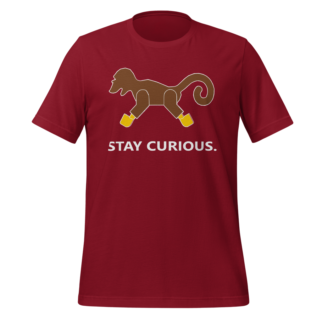 Cardinal red 100% airlume cotton t-shirt featuring classic fan-made brick monkey design with parody AFOL slogan "Stay Curious". Item is a BRKDrip AFOL essentials shirt with a vintage pirate building blocks aesthetic.