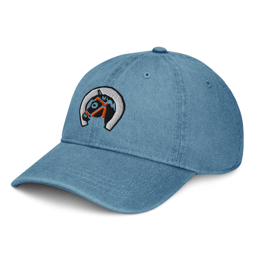 Side profile of denim dark blue cotton baseball cap hat featuring embroidered sunset stables ranch design. Item is a BRKDrip AFOL Headgear Dad Hat with a modern town building blocks aesthetic.