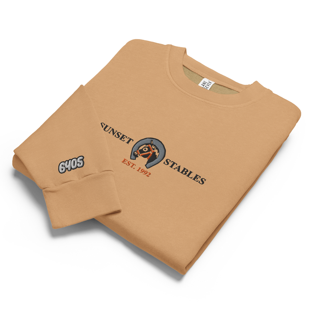 Burro brown tri-blend fleece sweatshirt featuring a classic fan-made sunset stables ranch design embroidered across the front and setshirt number 6405 on the sleeve. Item is a BRKDrip Limited Edition Cozy Wear Sweatshirt with a classic town building blocks aesthetic.