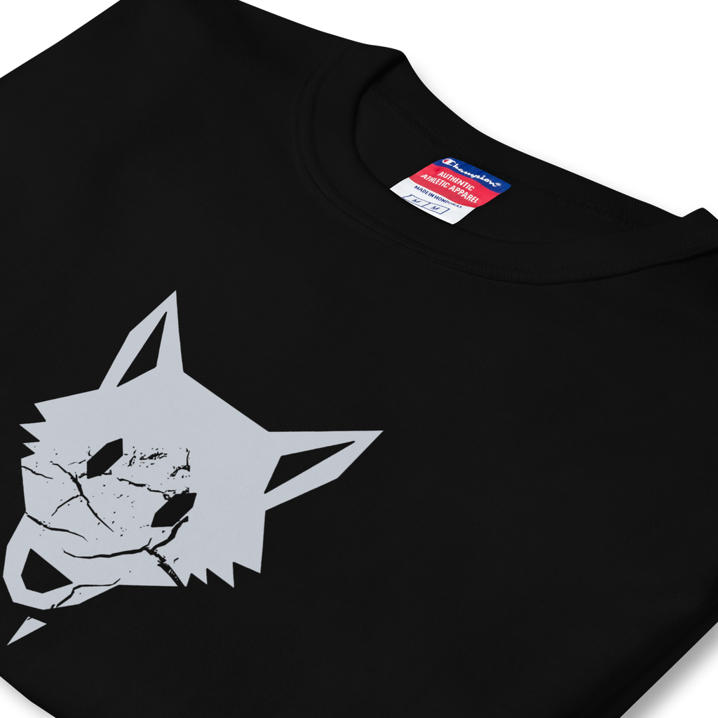 Folded side profile of black heavyweight, 100% cotton luxury Champion© t-shirt featuring aged wolfpack emblem and text "EST. 1992" indicating the year the faction was first introduced to the brick universe. Item is a BRKDrip Heritage Collection luxury shirt with a vintage castle building block aesthetic.